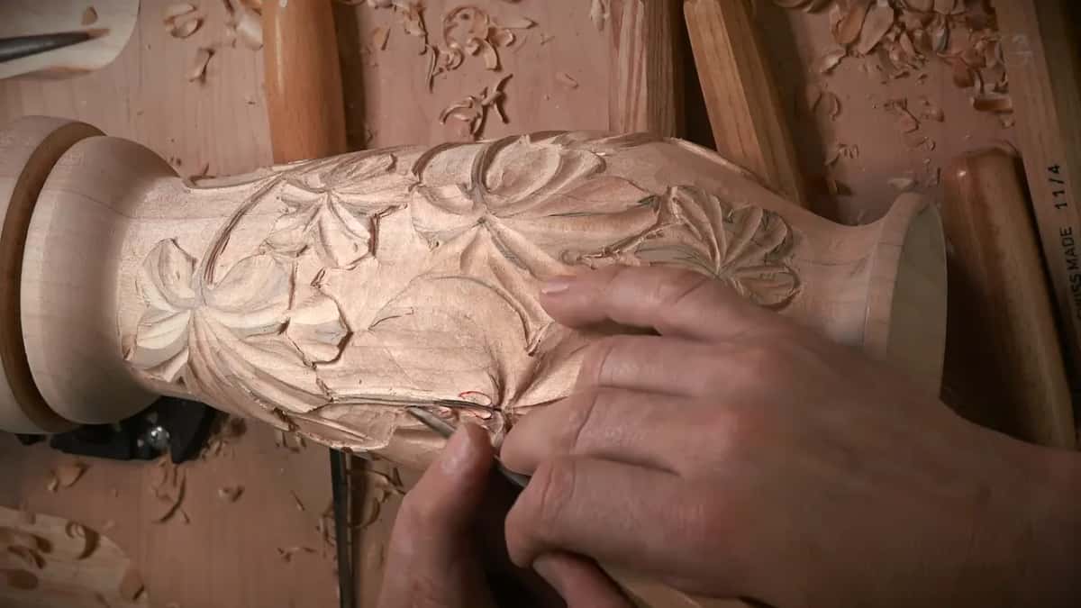 Gouge running a vein, a row of handles laid out behind it