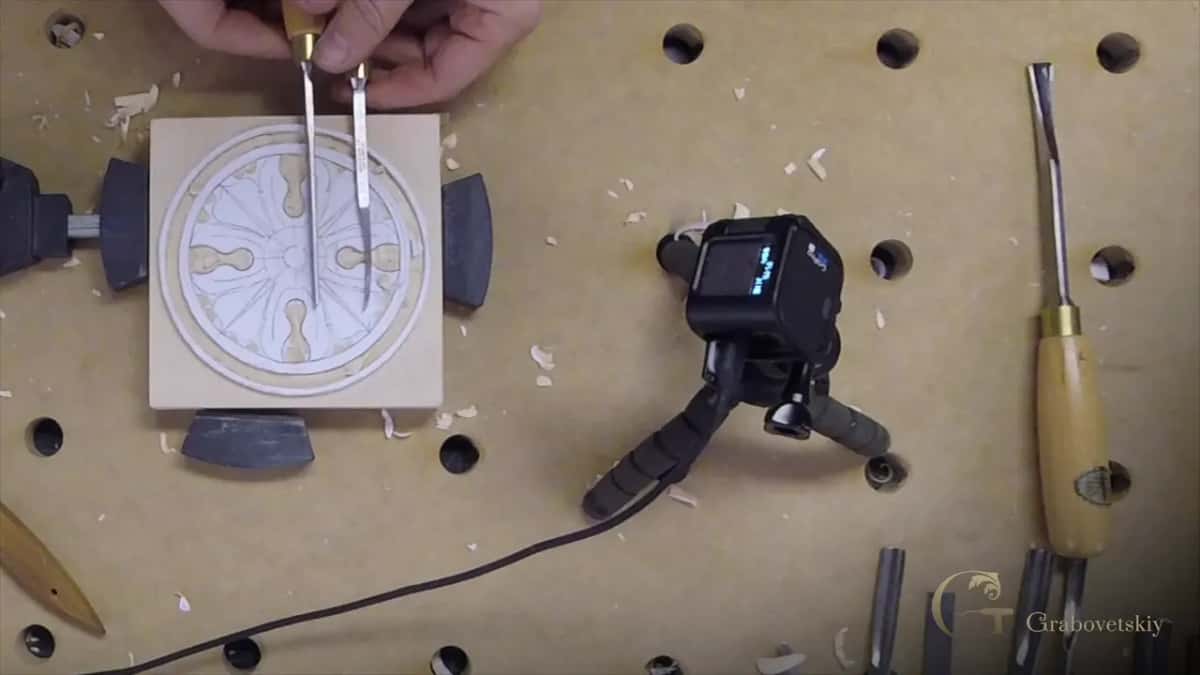 Two grounding tools on the bench together, and the difference between them visible at a glance
