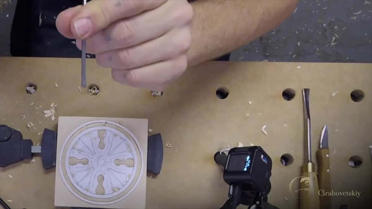 Handle pinched an inch back, which is how the small cuts get steered