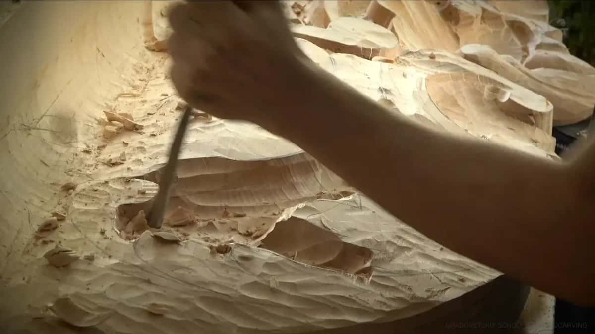 Chopping straight down.