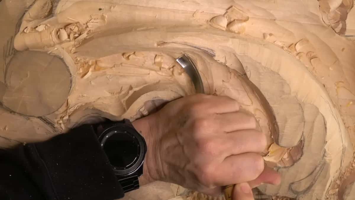 Pressing a bent gouge in.