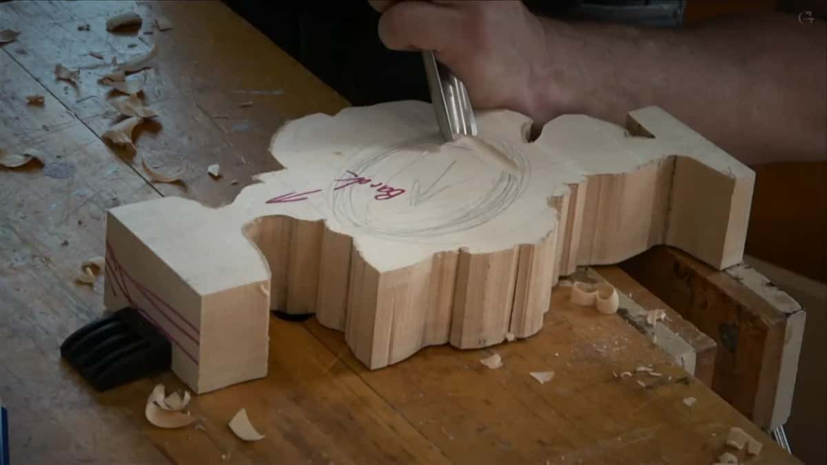 Upper blank turned face down with Back written on it, a pencilled patch, gouge starting the hollow