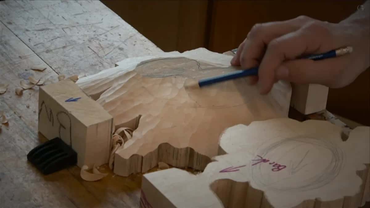 Pencil circle marking out the overlap patch on the domed lower blank below