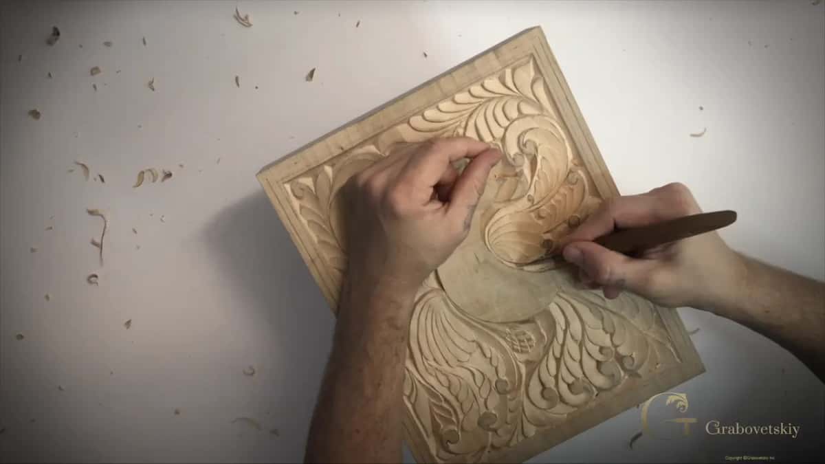 Carving away the last of the red mark, the final tidy before the knife goes down for good on this wing.