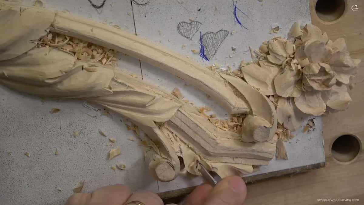 Whole panel from above, molding running the length of it under the acanthus.