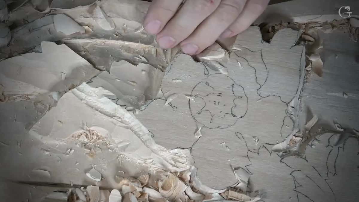 Fingers resting on freshly roughed leafage