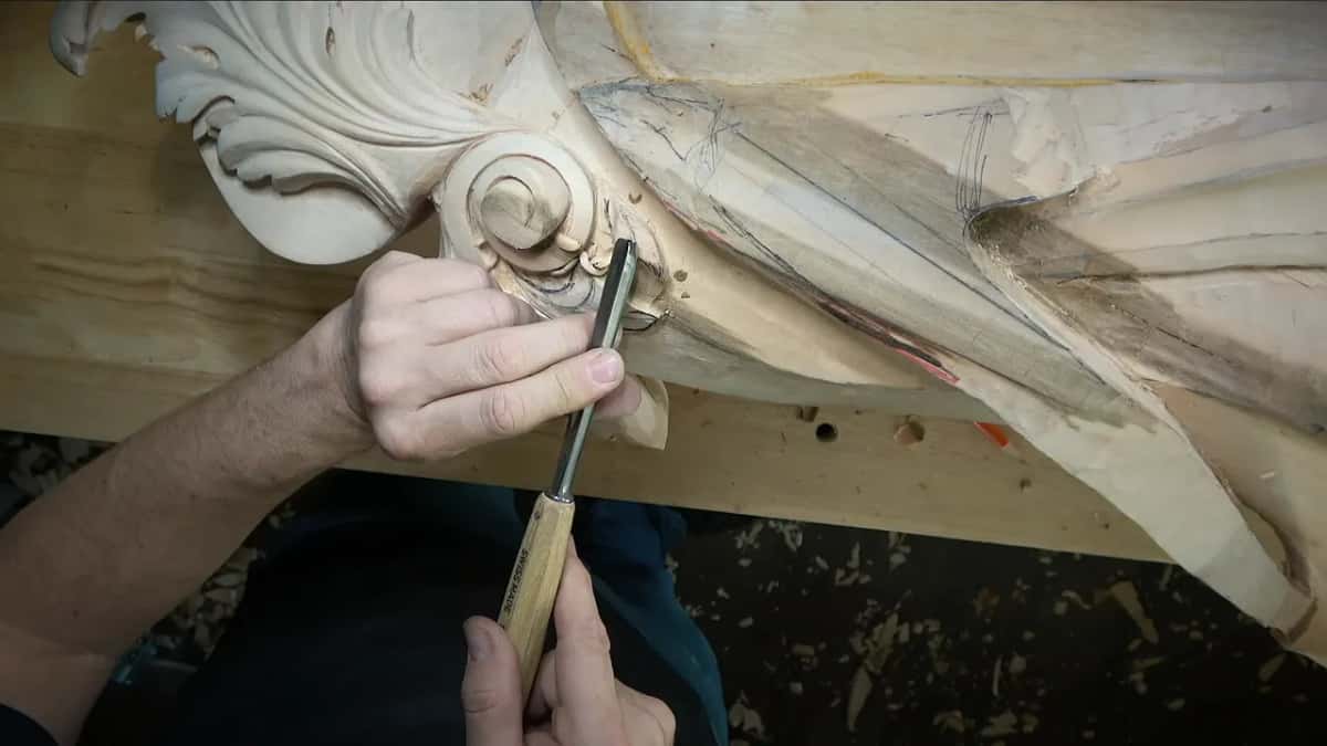 The other way Two hands on a Swiss Made gouge at a small volute