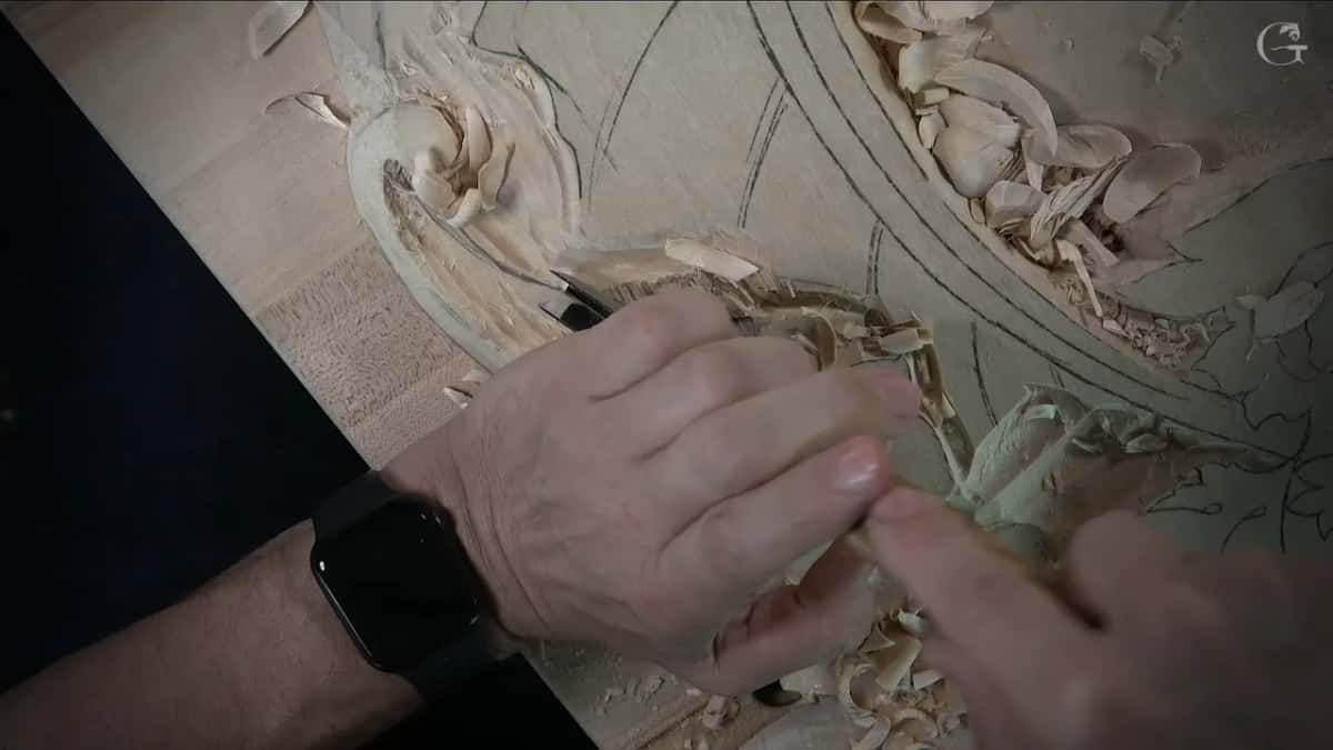 Both hands on one tool