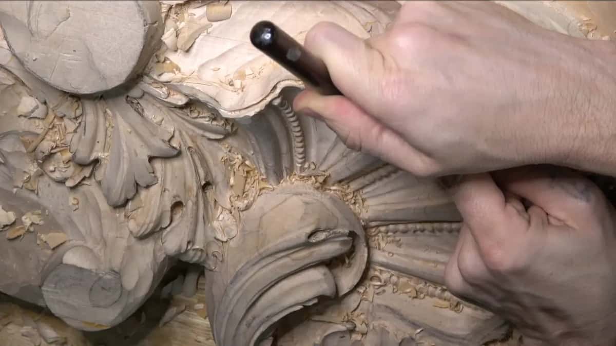 Dark handle over the bead row.