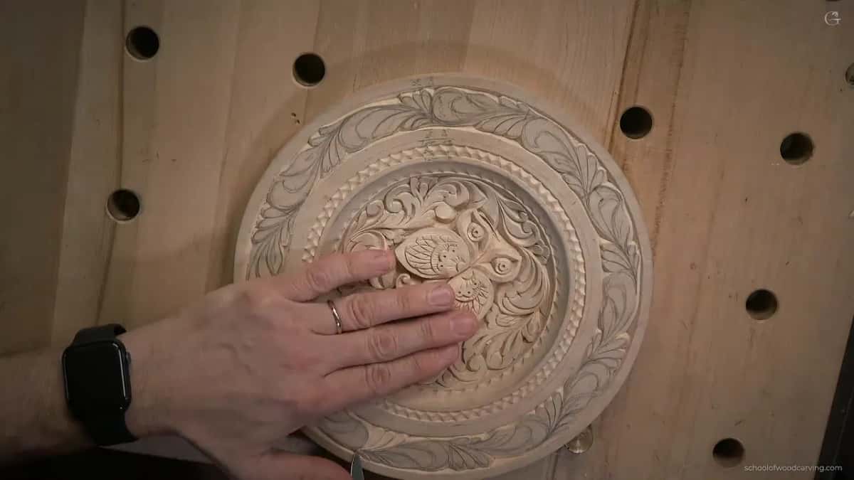 Palm flat over the carved butterflies