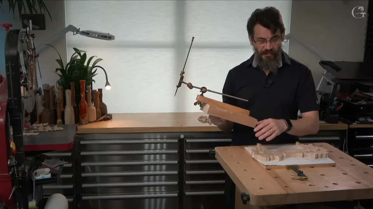 Measuring arm standing beside the sawn blank