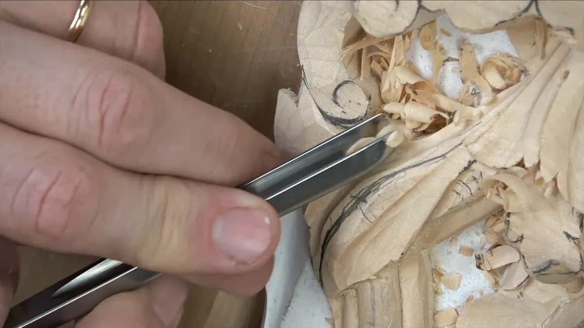 Same veiner rolled round so its flute sits nearer ten, which puts one corner into the cut and leaves the other clear