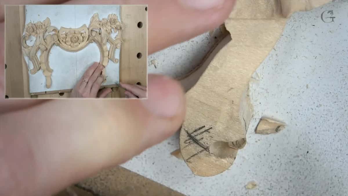 Loose detail held between finger and thumb because it is too small and too weak to clamp anywhere