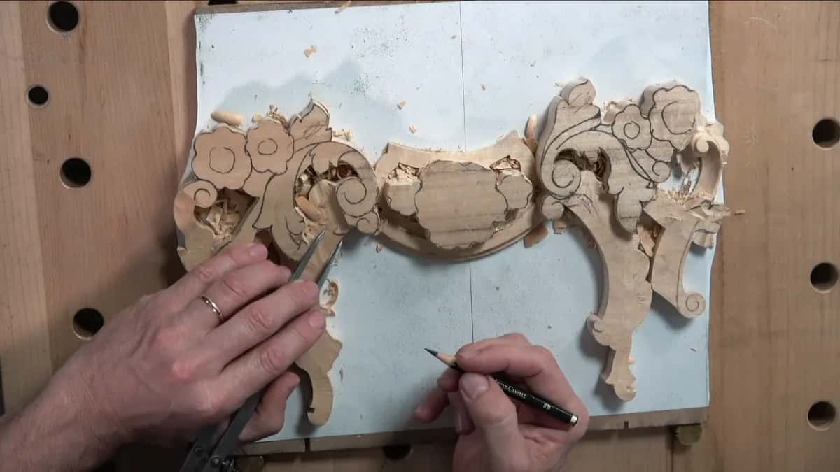 Pencil marks the widest spot, half an inch, on both sides of the block before any tool touches it
