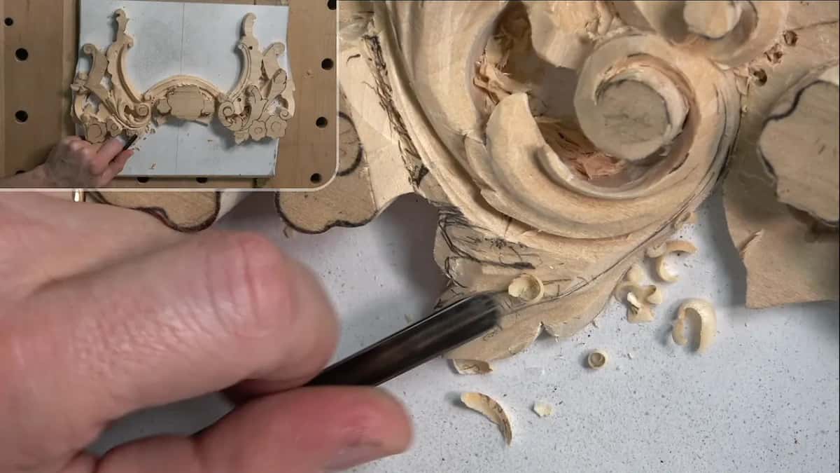 One concave carried to its point and a second to the other, with the raised centre left between them