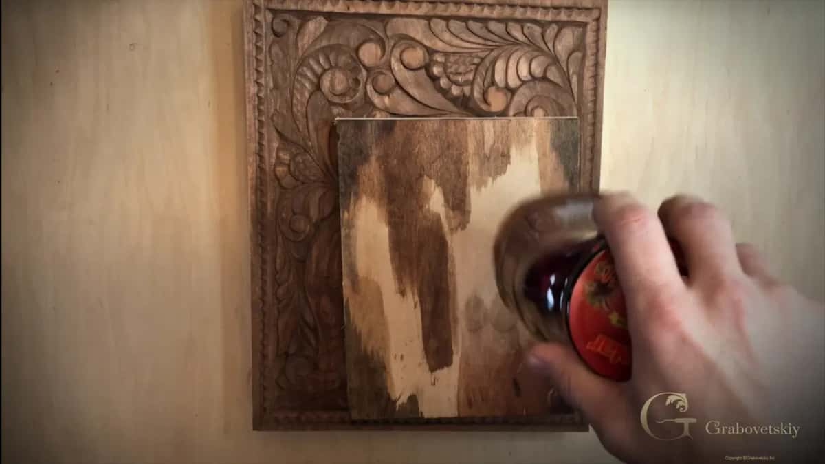 Jar of vinegar with iron sitting in it.