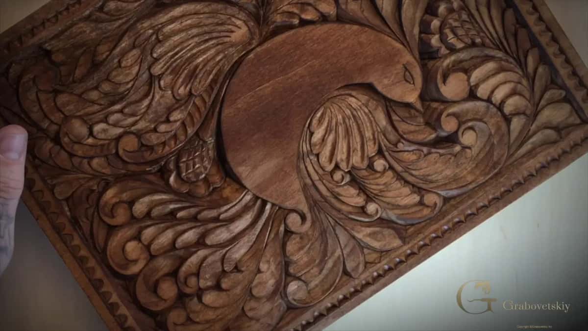 The whole board turned to the light once the walnut stain is on, every hollow darker than the surface around it.