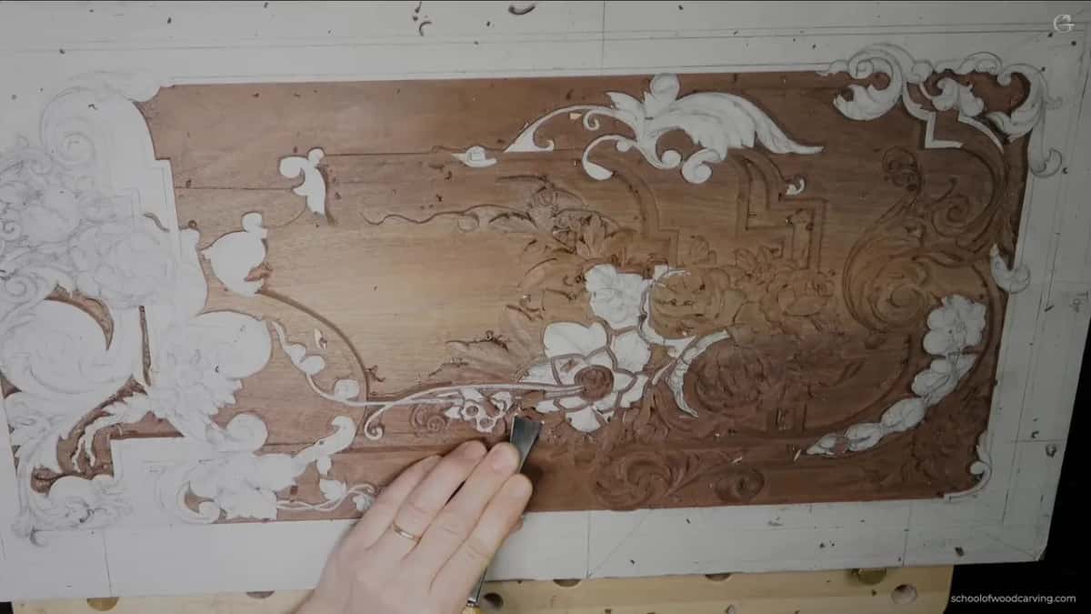 The panel seen whole from above with a single hand at the bottom edge.