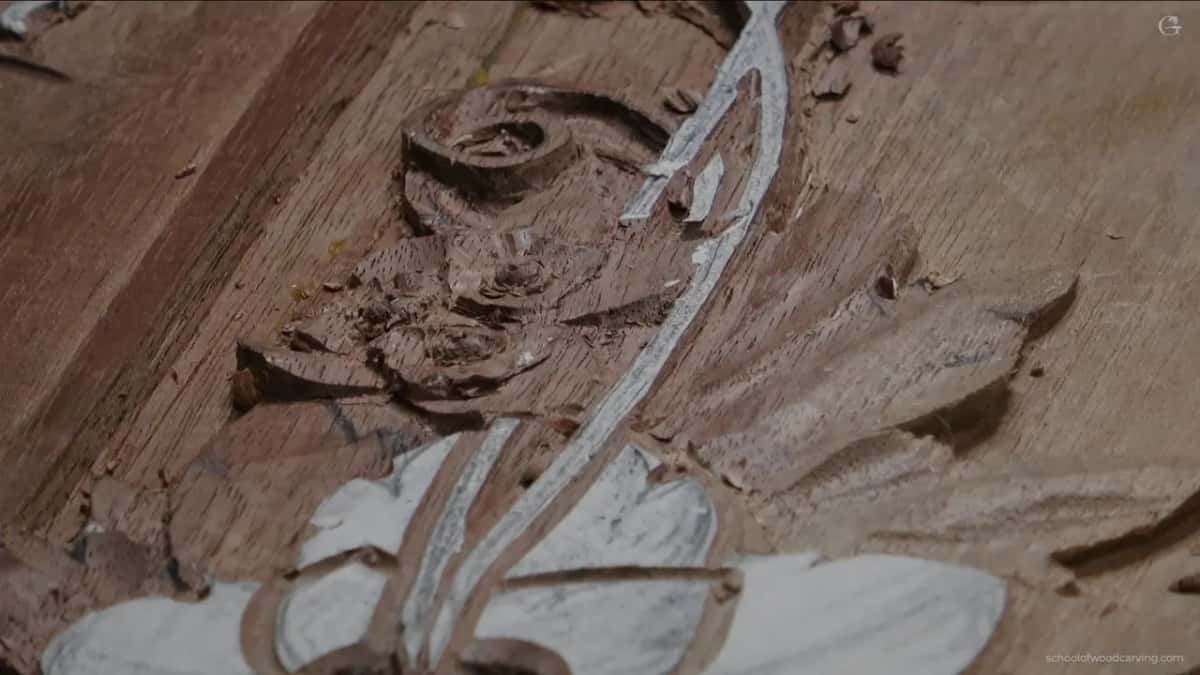 Carved petals overlapping in one consistent direction, with nothing else in the frame to distract from the order of them.