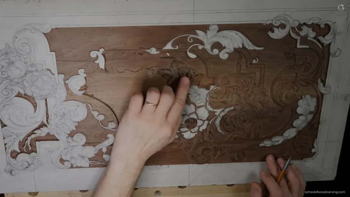The panel from overhead, hands resting on it.