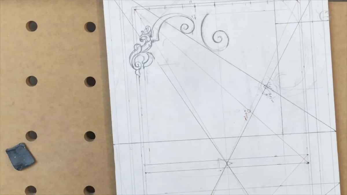 Whole panel alone on the drilled bench, a blue eraser lying to its left