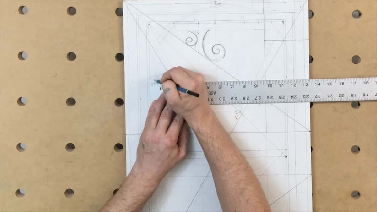 Big spiral and a smaller one up top, a rule below