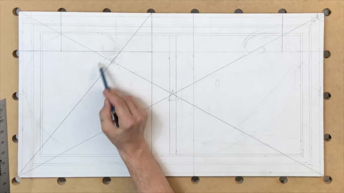Diagonals crossing the whole sheet, the pencil tip near the left crossing