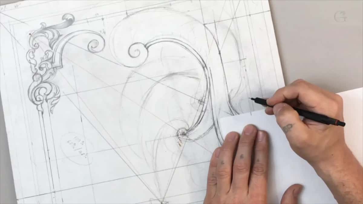White sheet laid over the drawing with the pen beside it