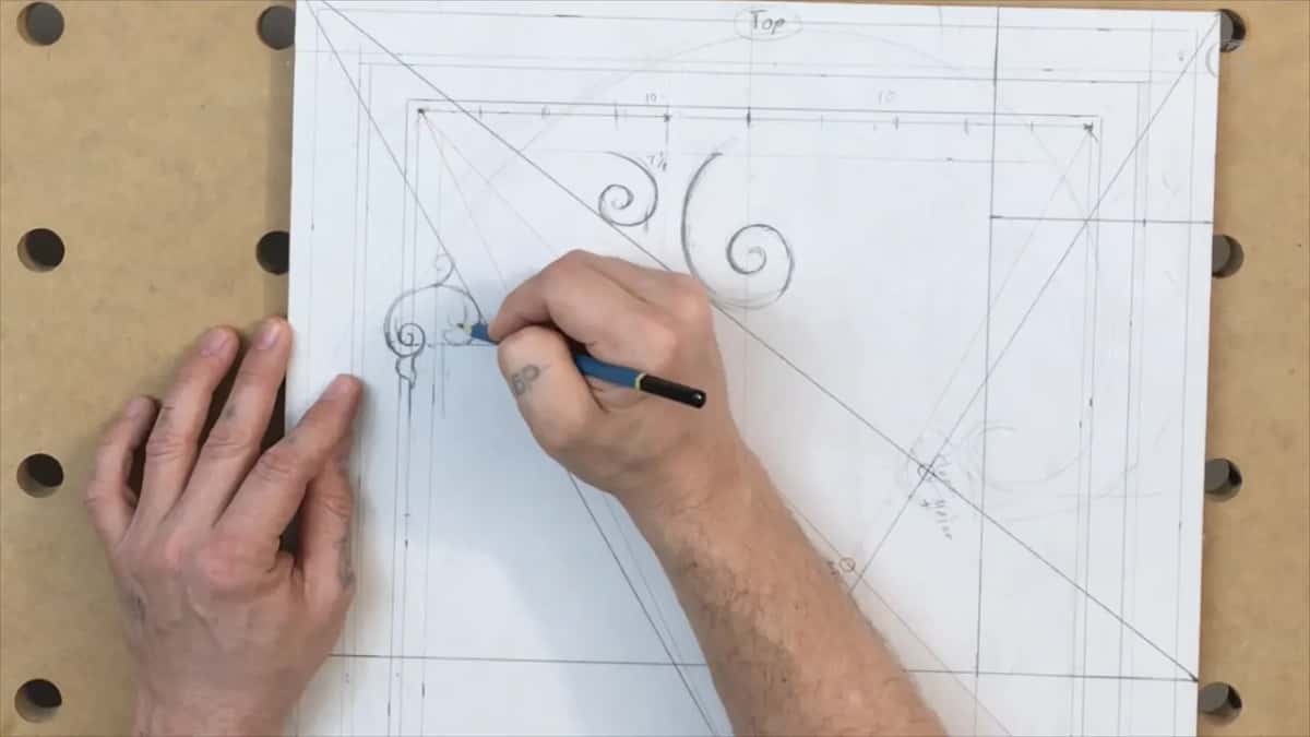 Three spirals on the panel and a small detail going in at the left