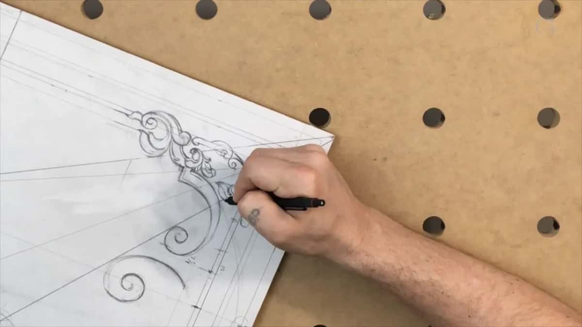 Pencil inside the leafy scroll