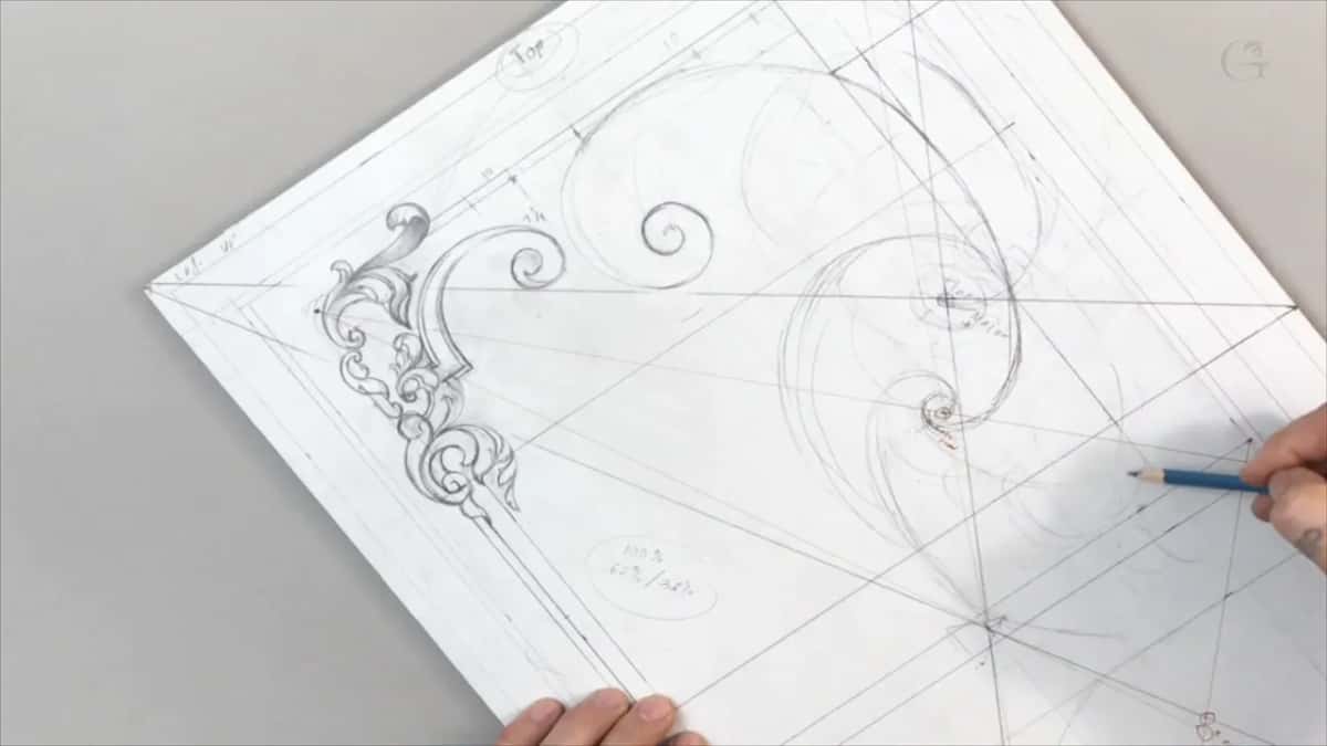 Sheet turned on its corner, blue pencil coming in from the right