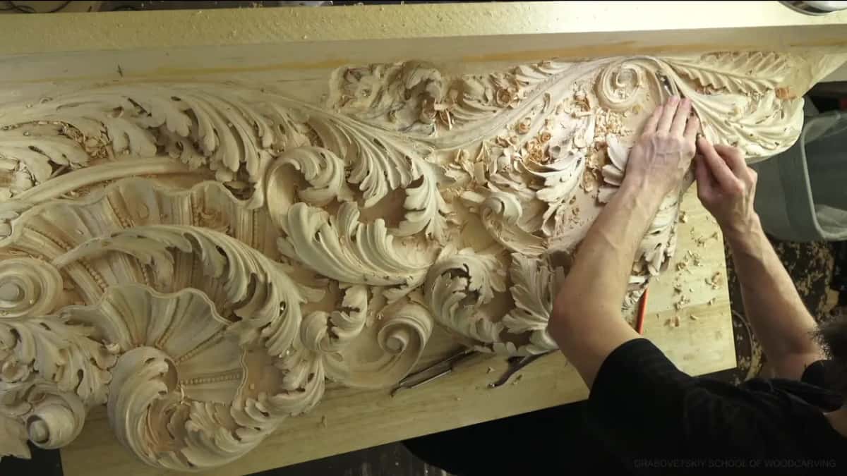 From a low angle, the long panel and two arms at its far end.