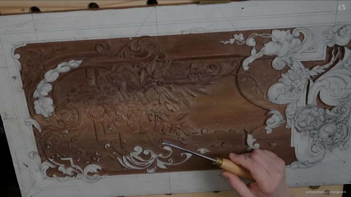 The board from above with the flat gouge turned over, riding on the tops of the facets instead of cutting into them.
