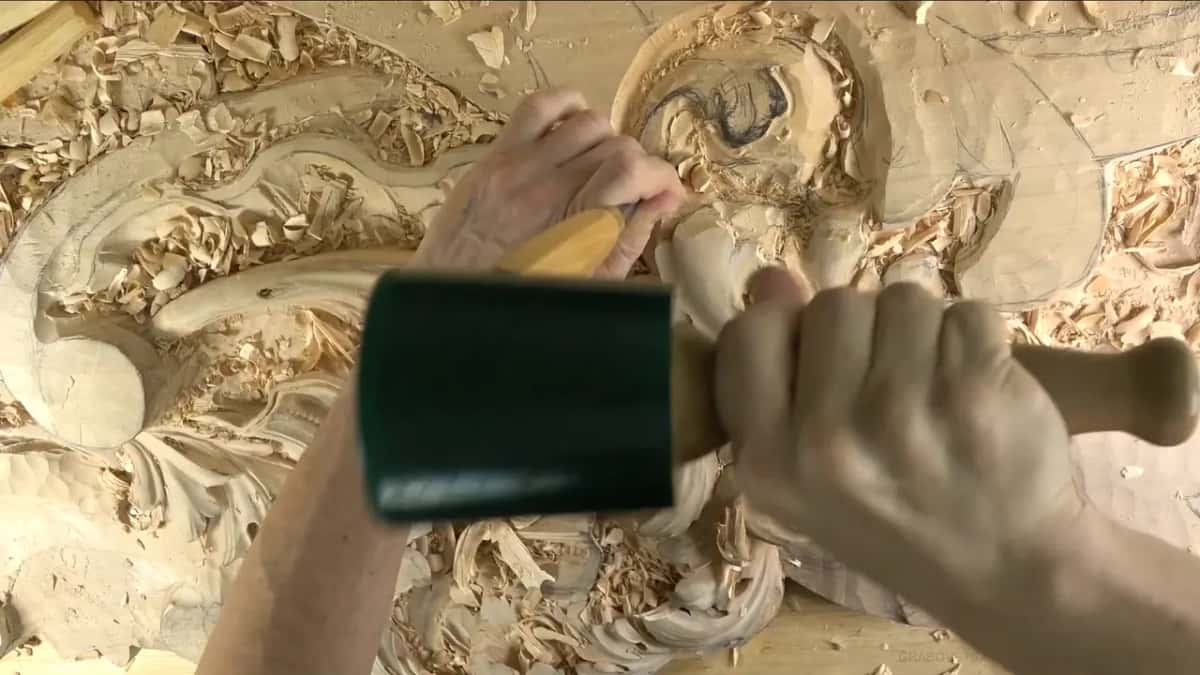 Green mallet, striking.