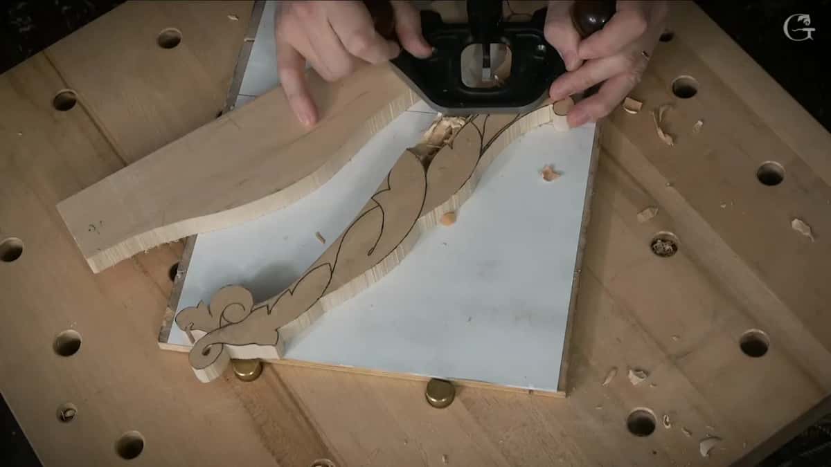 Shavings curling out from under the plane.