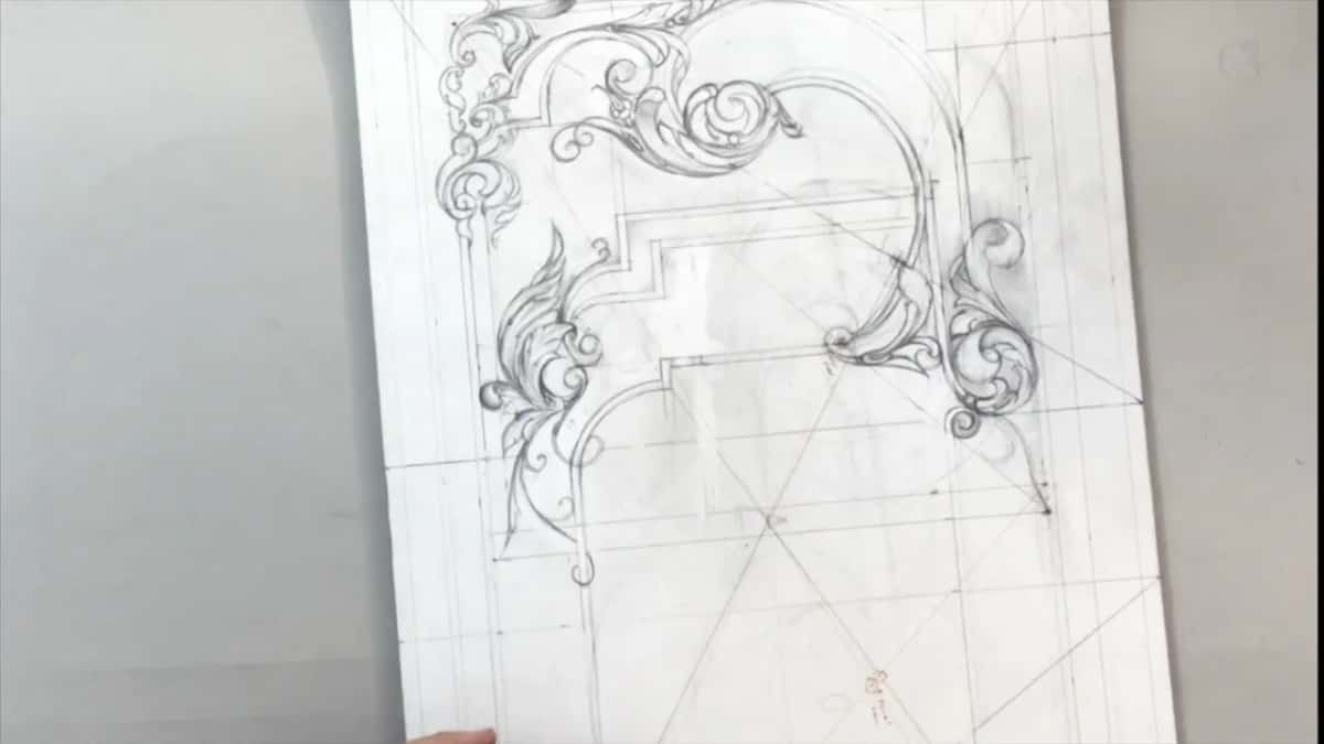 Scrolls along the top and down both sides, seen square on