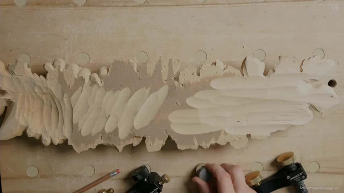 Back of the panel, turned over and clamped to reach the undercuts