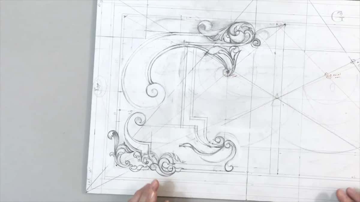 Board turned sideways, ruled lines and curling scrolls