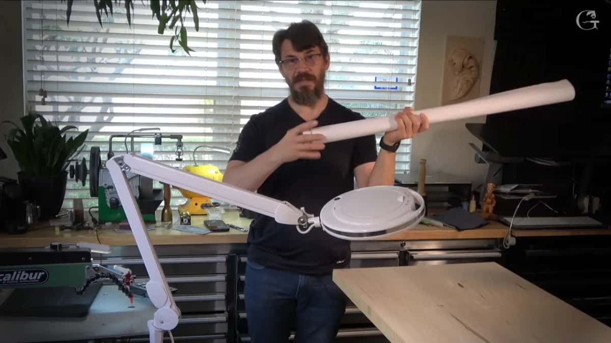Long paper roll held in both hands