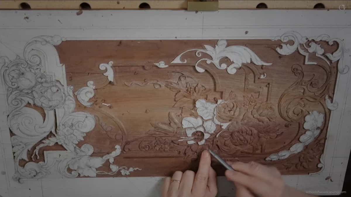 Hands flat on the board, working out which way the shadow runs.