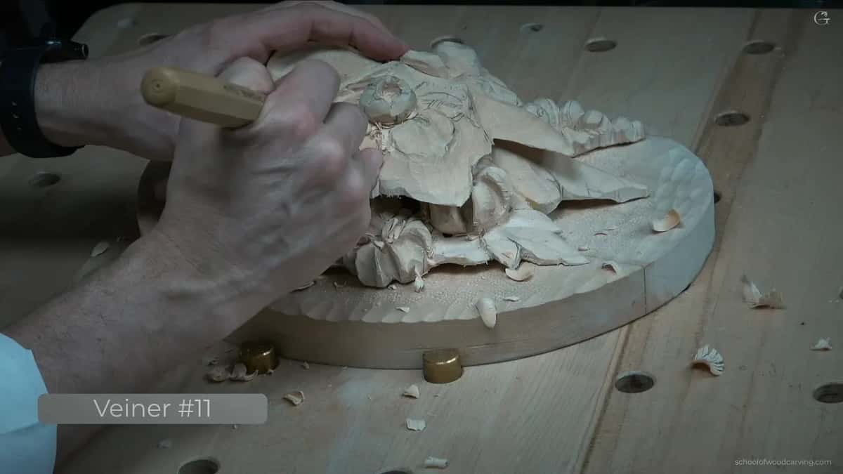 The curl coming round on itself, shavings collecting on the round board