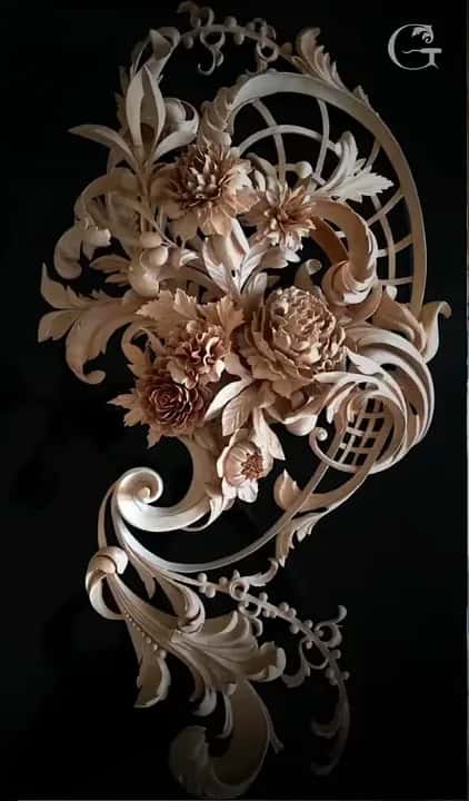 Photo of a carved flower cluster with scrolls and lattice, the piece he calls eight inches deep