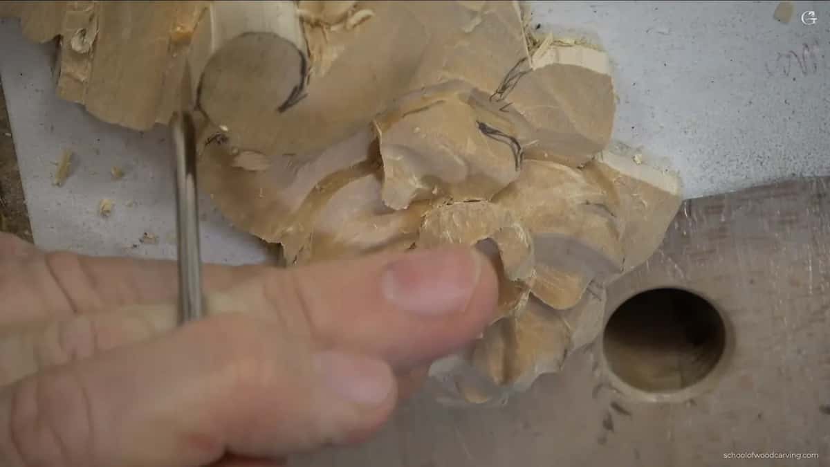 Coming at the plunged hole sideways, so the waste falls out in one piece.