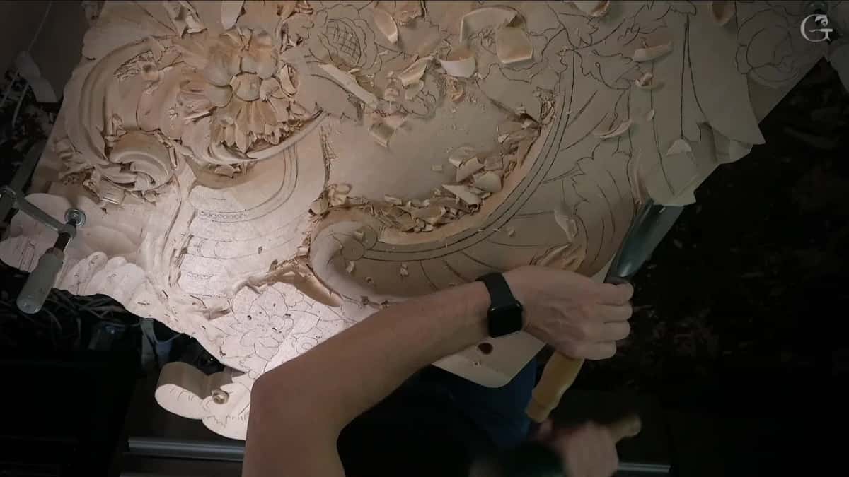 The whole panel from above, a clamp on the left and one arm working the right side