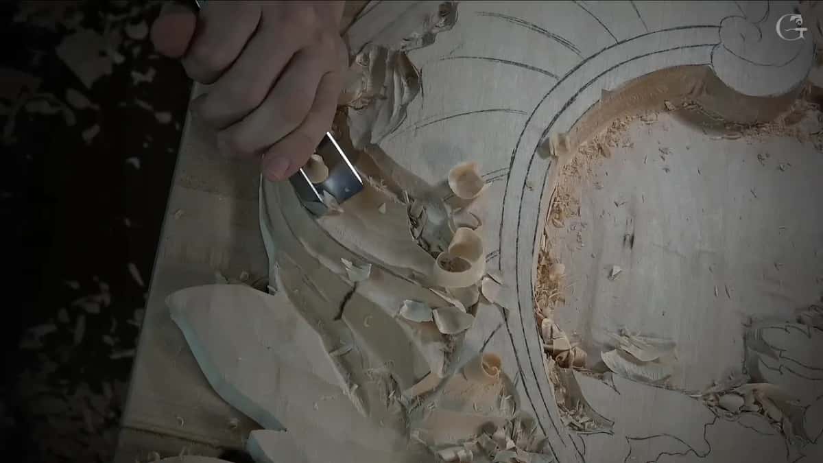 Shavings curl off it