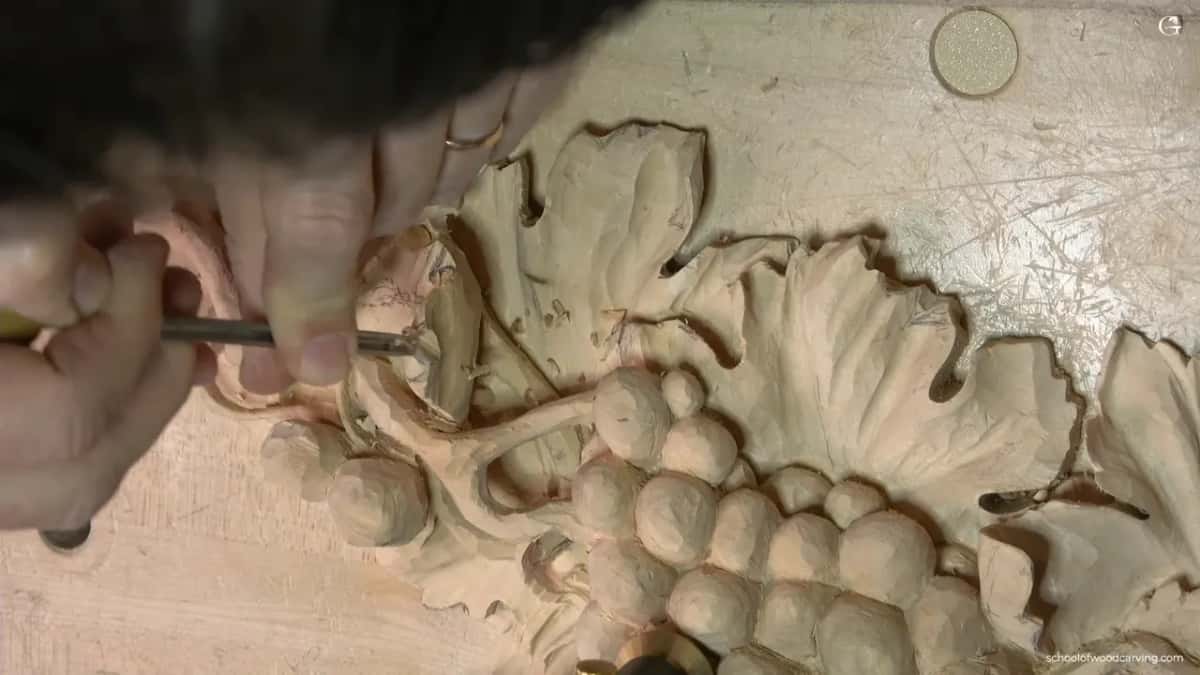 Narrow groove opening along the pencil line, ahead of any separation cut going in