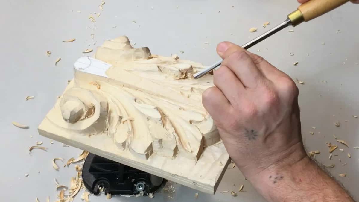 Ferruled handle at the upper right, taking the wave out of a line