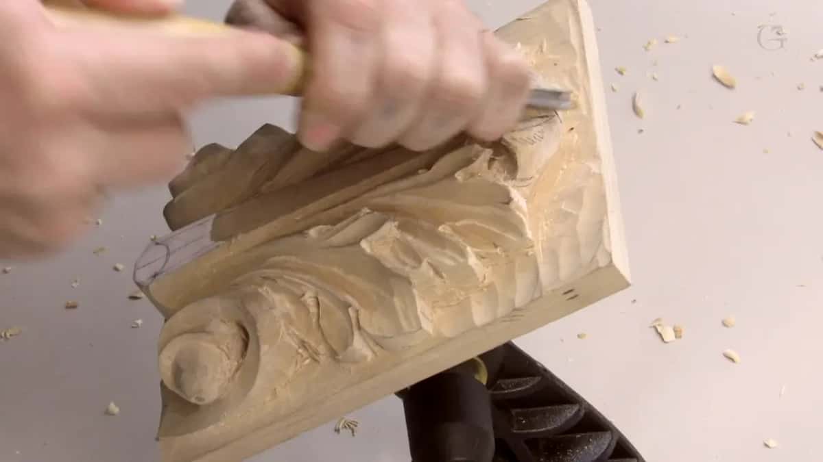 Angled shot of the board with a pale handle at the upper left carving the concave