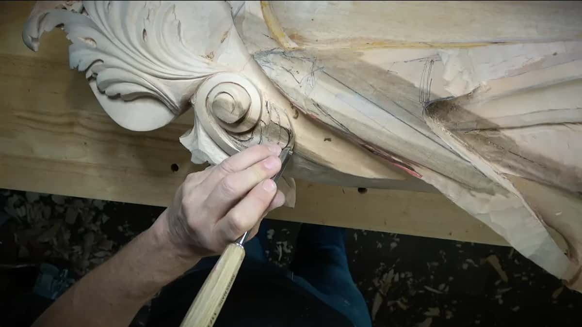 Gray streaks in the wood beside the scroll