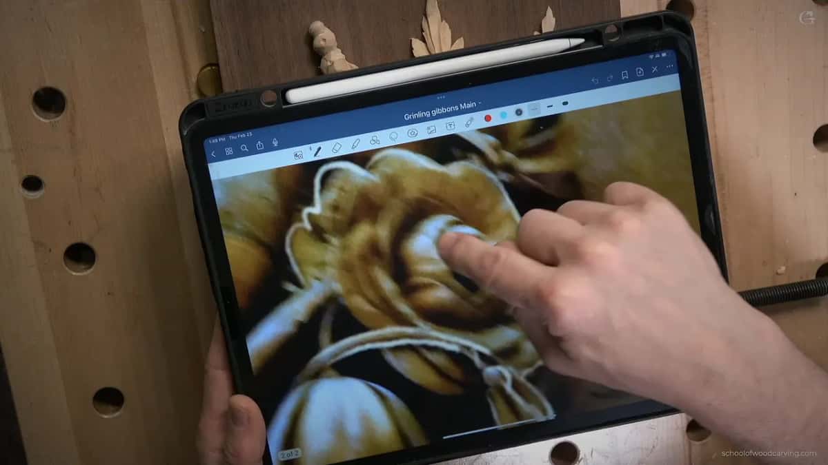 Gibbons's original on the iPad, a finger on its swirl
